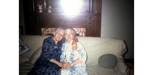 Advanced Retouched Photo, “Two Women Sitting on a Sofa”