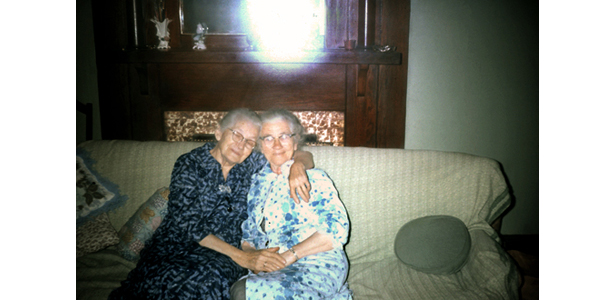 More Advanced Retouched Photo, “Two Women Sitting on a Sofa”