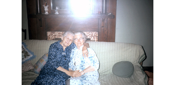 Basic Retouched Photo, “Two Women Sitting on a Sofa”